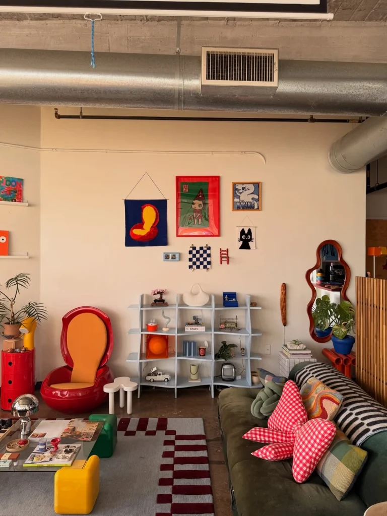 Bold Toca Boca living room wall decor featuring fabric art