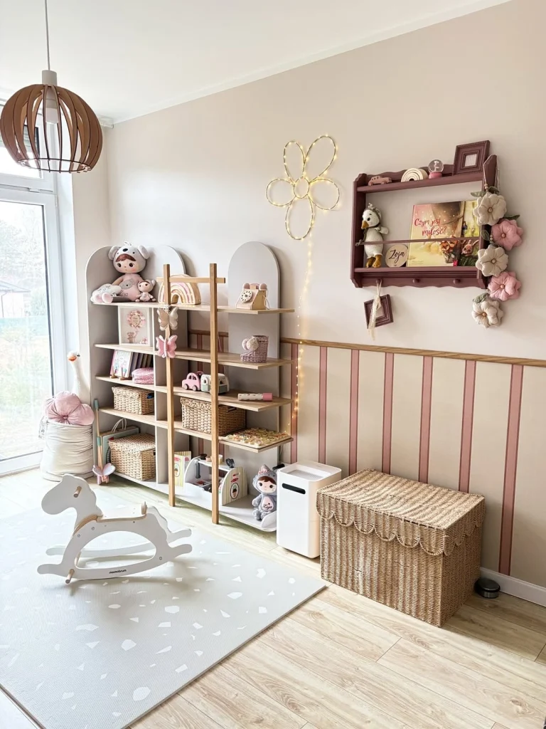 Dreamy pink girls' room with Montessori-style open shelving