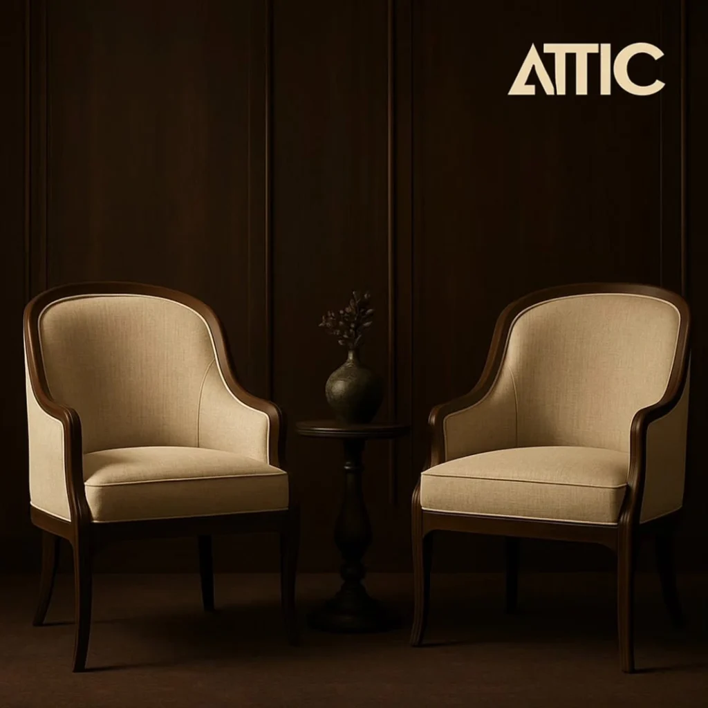 Classic cream linen chairs with dark walnut carved frames in dramatic lighting