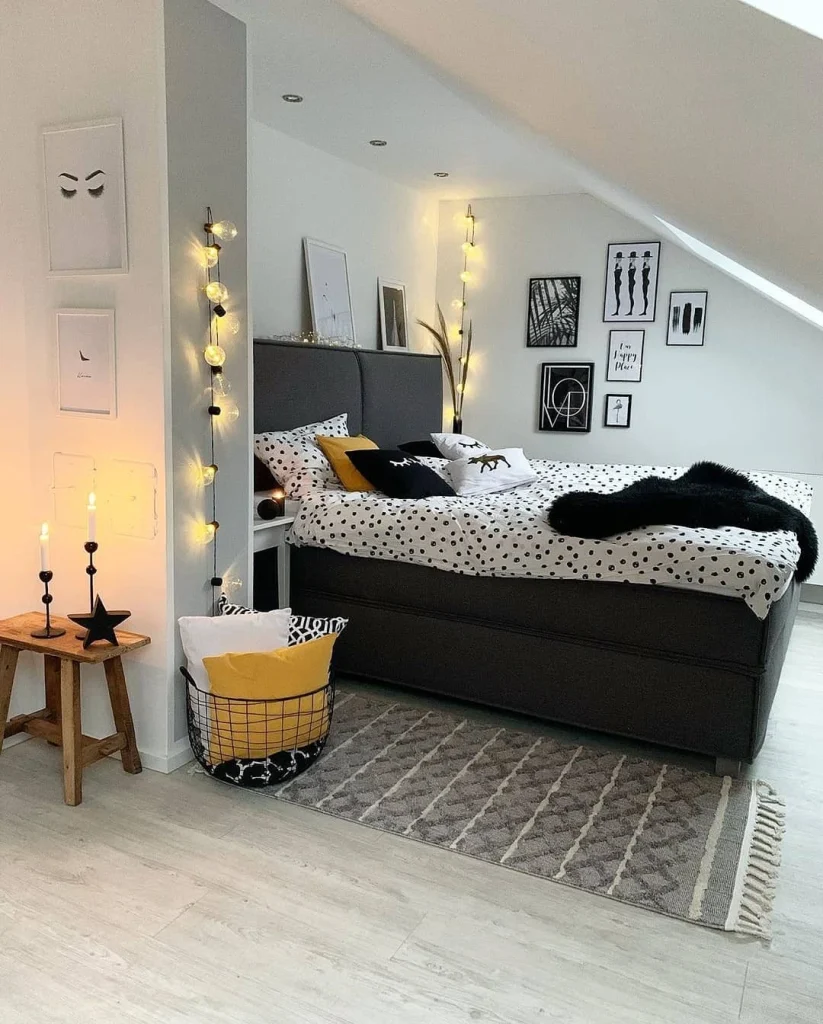 Bold glamorous bedroom with black accent wall
