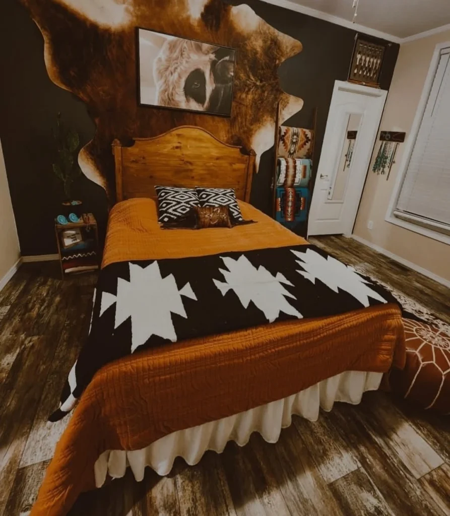 Western bedroom with cowhide wall panel backdrop